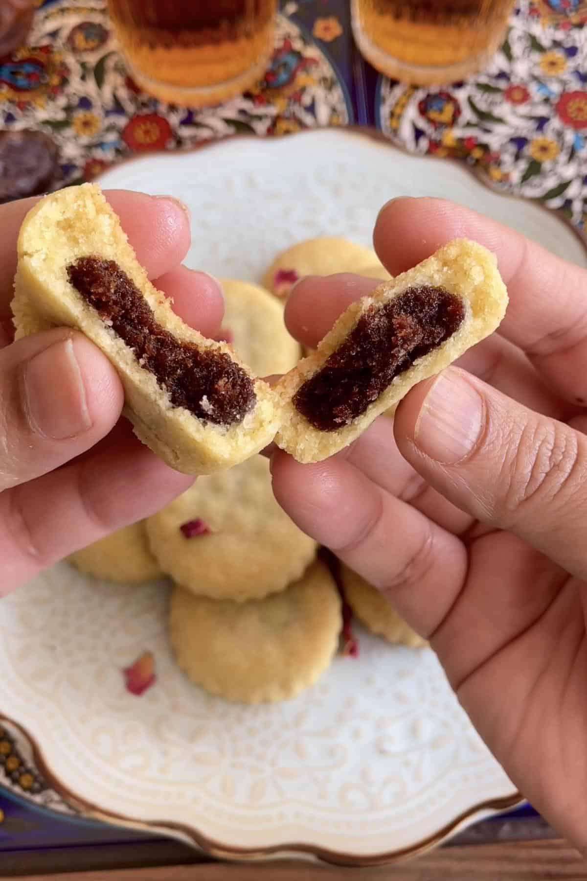 Broke open a date stuffed maamoul to show the inside. 