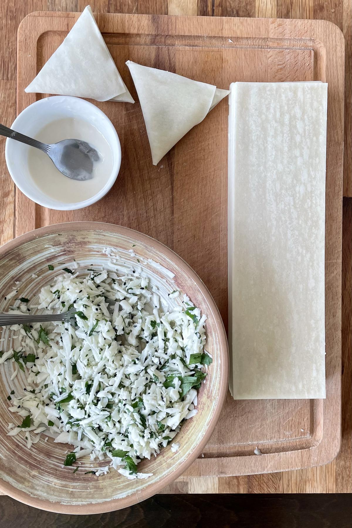 Halloumi cheese sambousek filled samosa sheets. 