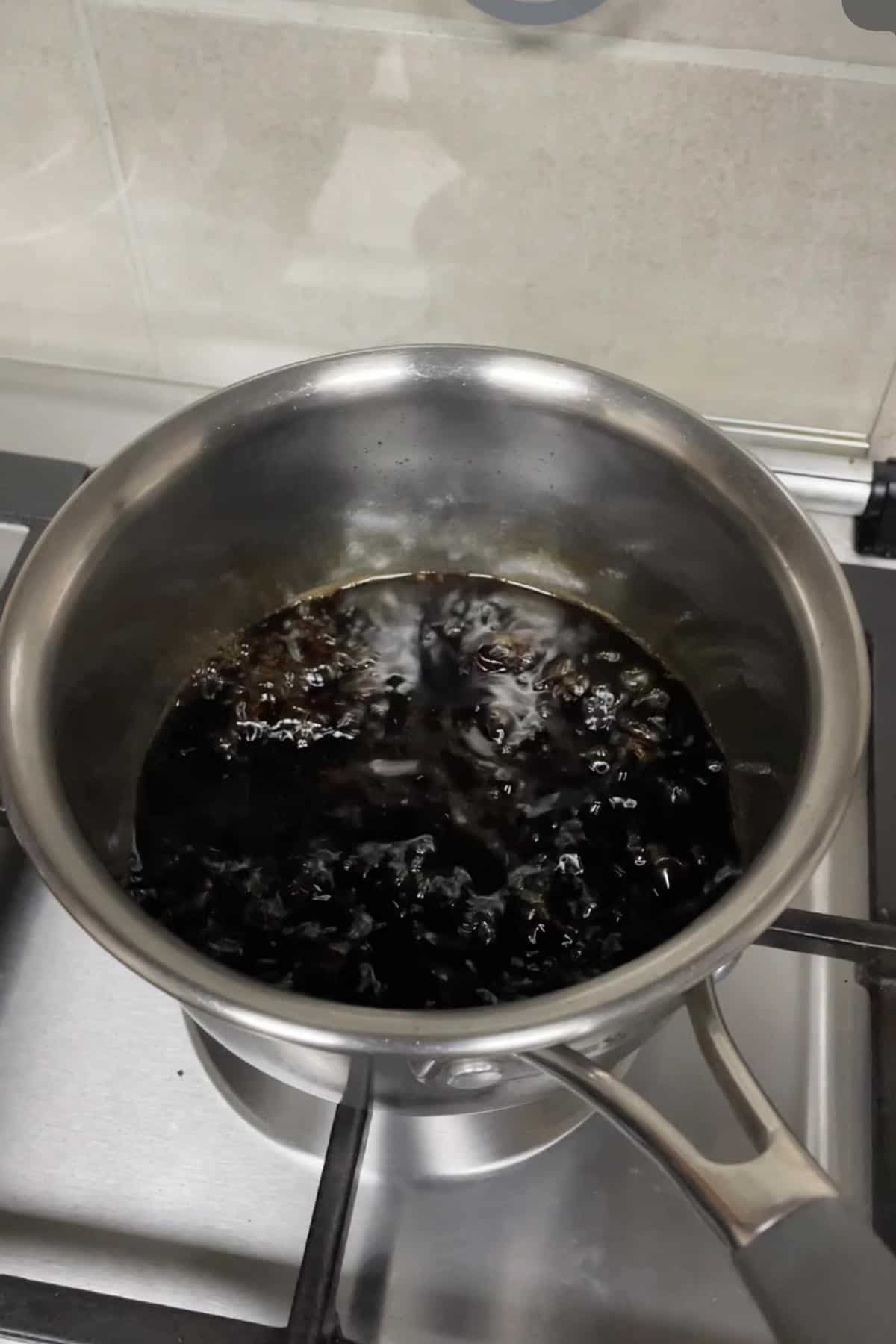 A saucepot of melted jaggery